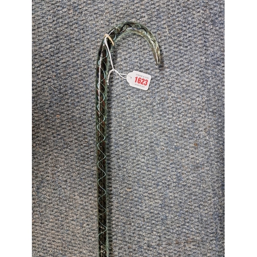 1623 - A Stourbridge clear and colour twist glass cane, 95cm long. 