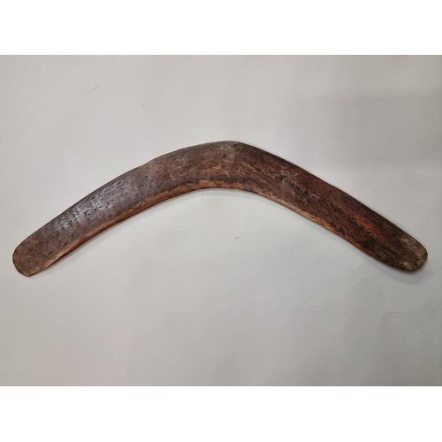 1642 - Ethnographica: a Boomerang, with engraved decoration, 52cm wide. 