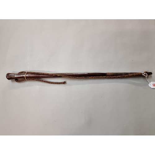 1643 - Ethnographica: a wood and rope whip, the handle 60.5cm long.