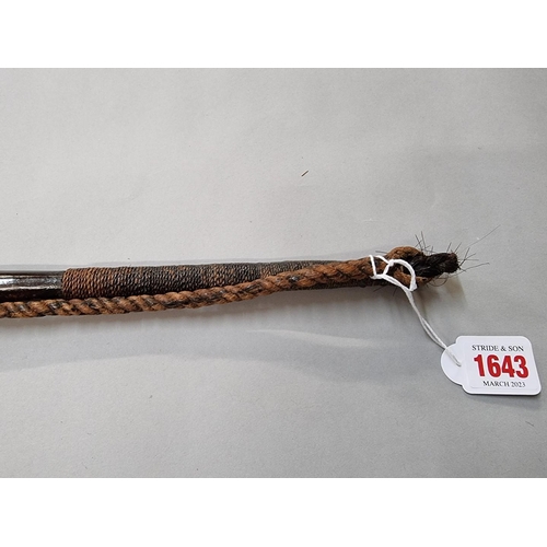 1643 - Ethnographica: a wood and rope whip, the handle 60.5cm long.