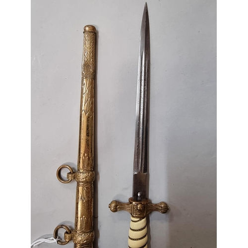 1646 - A German Third Reich Naval Officer's dagger and brass sheath, by WKC.