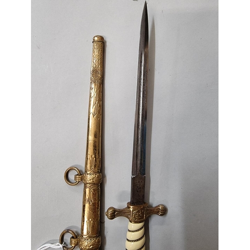 1646 - A German Third Reich Naval Officer's dagger and brass sheath, by WKC.