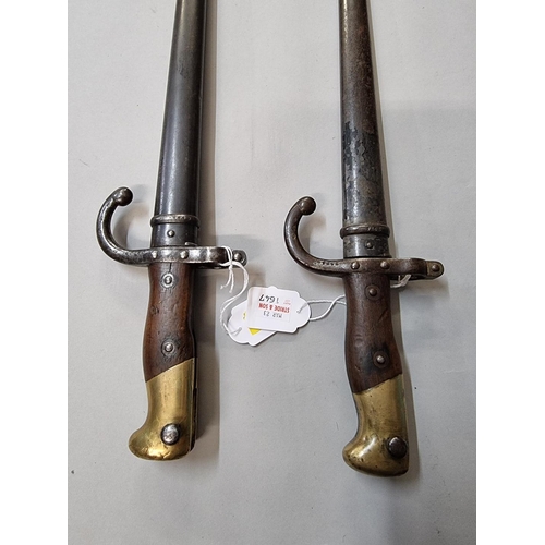 1647 - Two French T back bayonets and scabbards, dated 1875 and 1877, both marked St Etienne and numbered 1... 