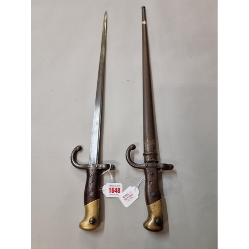 1648 - Two French T back bayonets and one scabbard, one dated 1878, marked St Etienne, the other indistinct... 