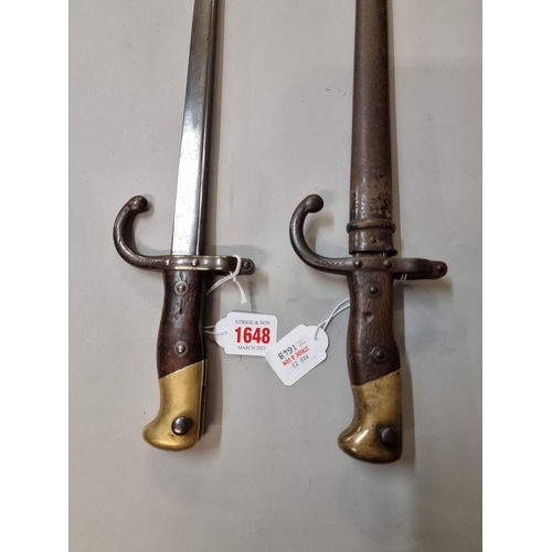 1648 - Two French T back bayonets and one scabbard, one dated 1878, marked St Etienne, the other indistinct... 