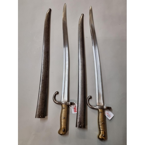 1650 - Two French Chassepot Yataghan bayonets, one numbered 19573 and dated 1871, with matching numbered sc... 