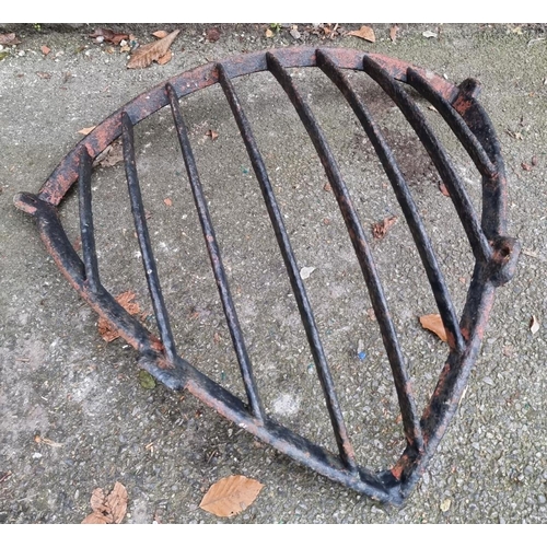 1677 - A Victorian black painted cast iron corner hay feeder, 87cm wide.