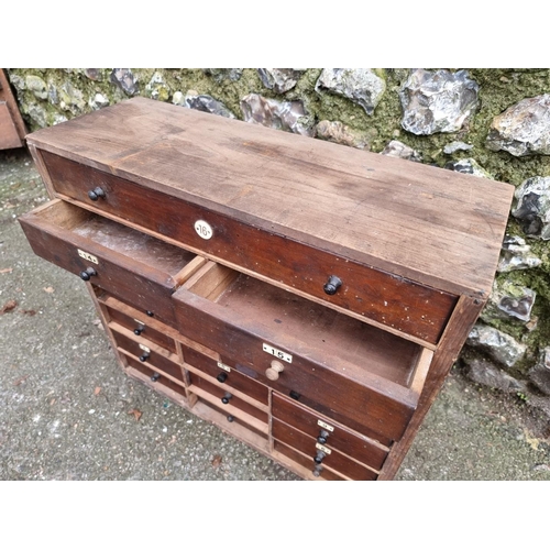 1679 - A small antique pine collectors chest, 51cm high x 56cm wide.