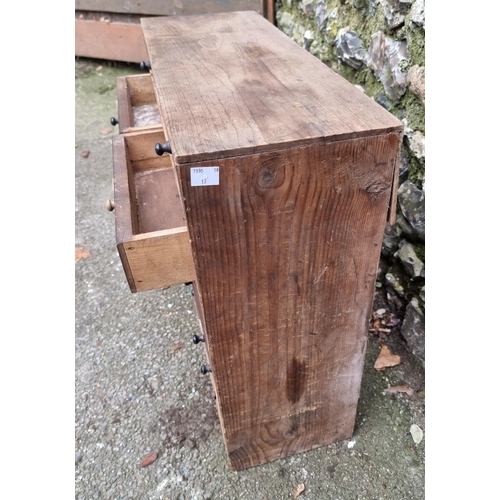 1679 - A small antique pine collectors chest, 51cm high x 56cm wide.