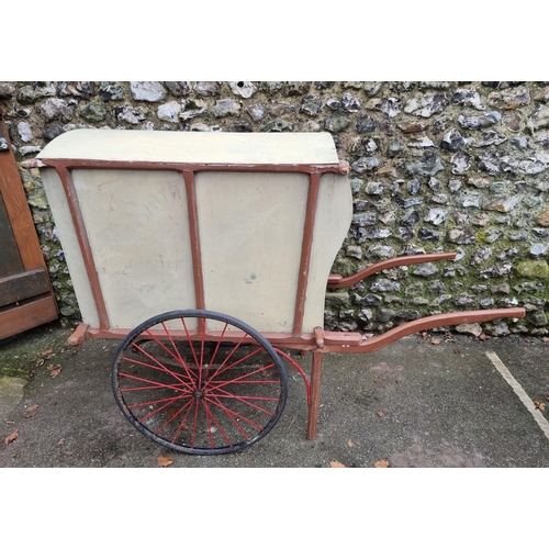 1680 - An antique covered market seller's apple cart or barrow, total length 163cm x 122cm high, wheelbase ... 