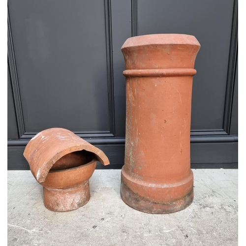 1694 - A terracotta chimney pot, 61cm high x 20cm wide; together with a similar chimney top.... 