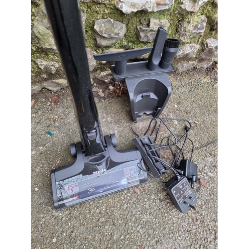 1697 - A Miele Triflex HX1 Cat and Dog cordless vacuum cleaner, with accessories.