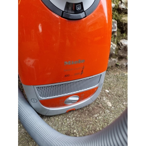 1699 - A Miele 'Deep Clean 300...2200w' vacuum cleaner.