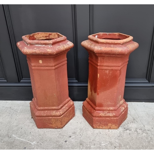 1702 - A pair of old red composition stone hexagonal chimney pot style planters, 62cm high x 36cm wide.... 