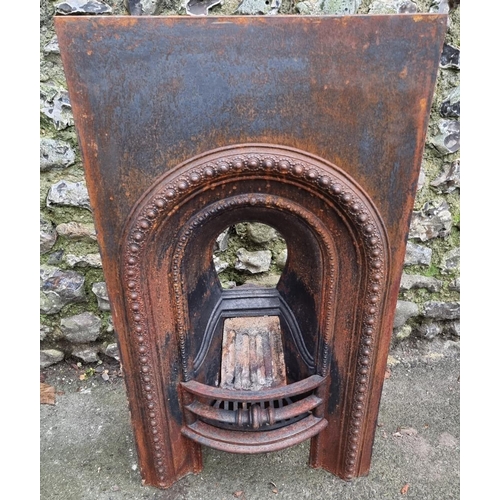 1703 - A cast iron fire insert, 92cm high x 51cm wide.