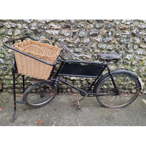 1704 - A vintage Raleigh tradesman's bicycle, with wicker basket to front pannier.