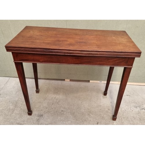 1151 - A George III mahogany tea table, 91.5cm wide, (rear legs warped).