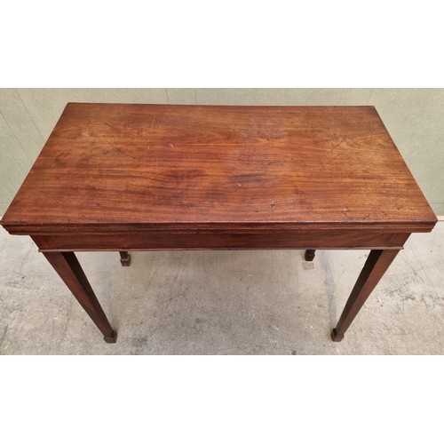 1151 - A George III mahogany tea table, 91.5cm wide, (rear legs warped).