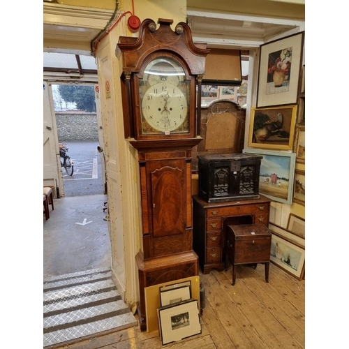 1052 - An early 19th century mahogany and inlaid eight day longcase clock, the 14in painted dial with moon ... 