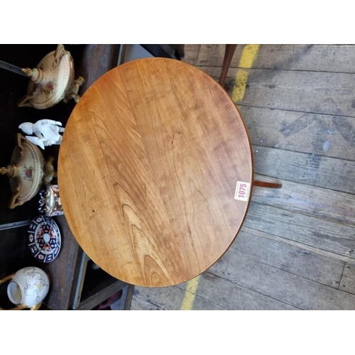 1075 - A pair of Shaker style cherry wood tripod tables, 45.5cm diameter. 