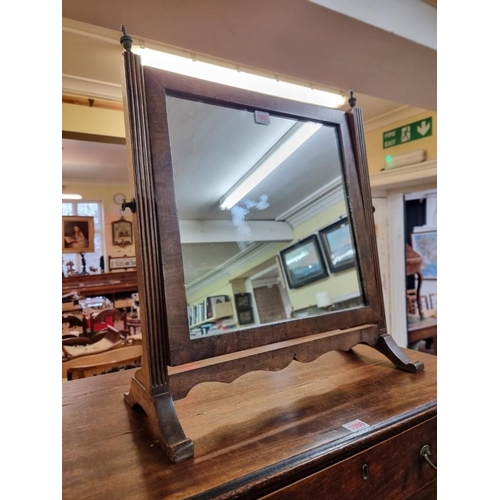 1081 - An early 19th century mahogany toilet mirror, 50cm wide. 