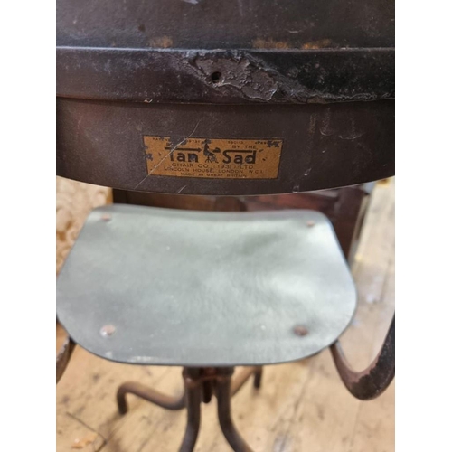 1093 - A vintage Tan-Sad industrial chair. 