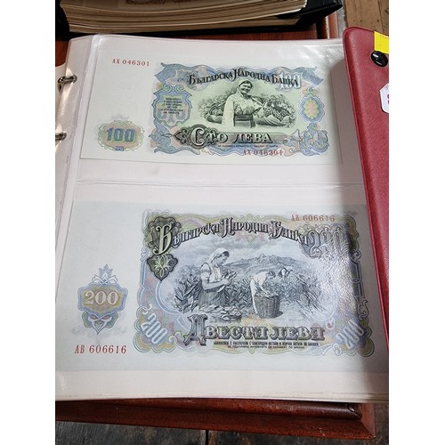 821 - Banknotes: four albums of World banknotes; to include: Europe; Asia; and North and South American ex... 