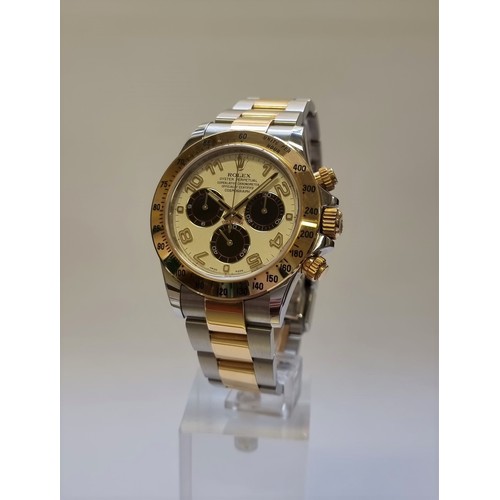 475 - A Rolex 'Panda Dial' Cosmograph Daytona 18k gold and stainless steel wristwatch, Ref. 116523, Serial...