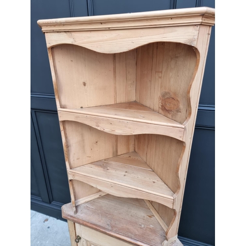 1018 - An antique pine standing corner cupboard, 170.5cm high x 64cm wide. 