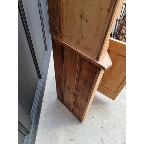 1018 - An antique pine standing corner cupboard, 170.5cm high x 64cm wide. 