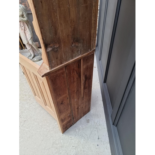 1018 - An antique pine standing corner cupboard, 170.5cm high x 64cm wide. 