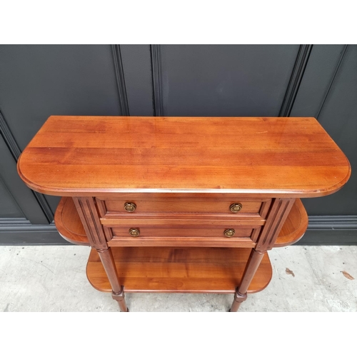 1022 - A reproduction cherry wood console table, labelled 'Anne de Morienne', 89cm wide. ... 