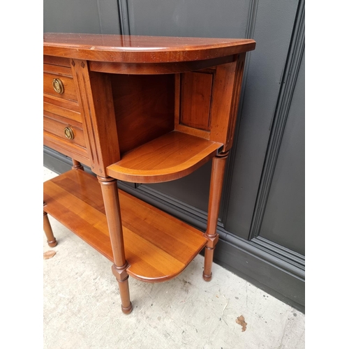 1022 - A reproduction cherry wood console table, labelled 'Anne de Morienne', 89cm wide. ... 