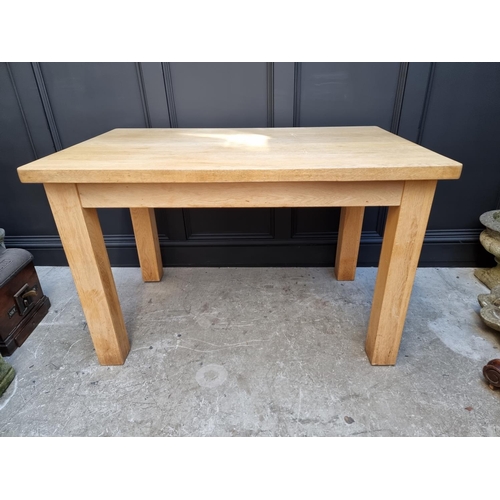 1024 - A modern pale oak kitchen table, 122cm long. 