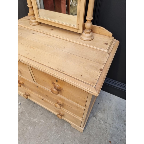 1025 - An antique pine mirror back chest, 85.5cm wide.