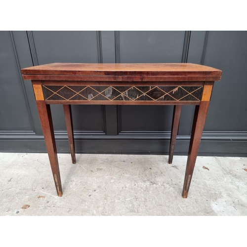 1029 - A late 18th century Italian mahogany and inlaid card table, 85.5cm wide, (a.f.). ... 