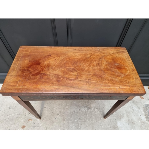 1029 - A late 18th century Italian mahogany and inlaid card table, 85.5cm wide, (a.f.). ... 