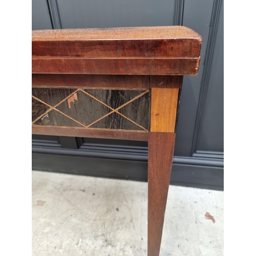 1029 - A late 18th century Italian mahogany and inlaid card table, 85.5cm wide, (a.f.). ... 