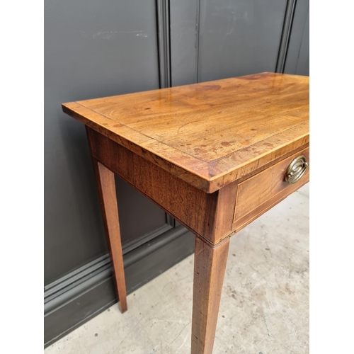 1031 - A George III mahogany and line inlaid two drawer side table, 76.5cm wide. 