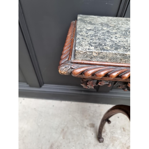 1036 - An interesting 19th century carved oak console table, with green marble top above a gadrooned frieze... 