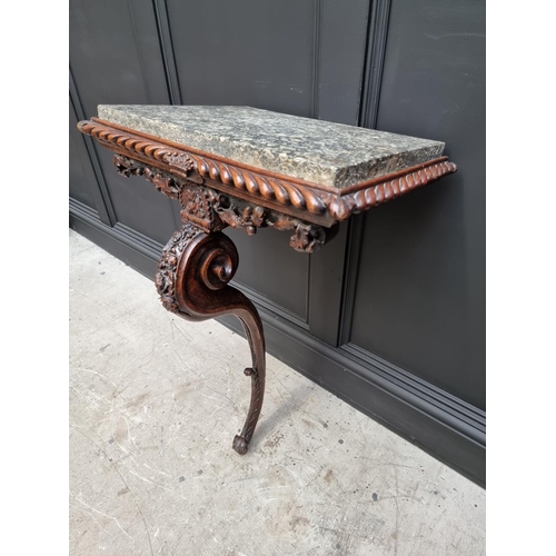 1036 - An interesting 19th century carved oak console table, with green marble top above a gadrooned frieze... 