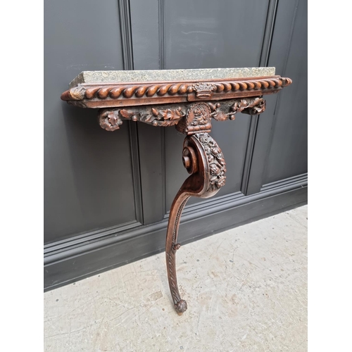 1036 - An interesting 19th century carved oak console table, with green marble top above a gadrooned frieze... 