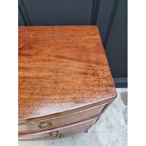 1043 - A George III mahogany and line inlaid bowfront chest of drawers, 105cm wide. 