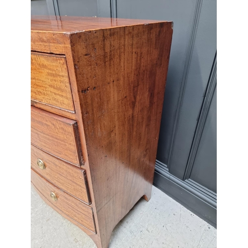 1043 - A George III mahogany and line inlaid bowfront chest of drawers, 105cm wide. 