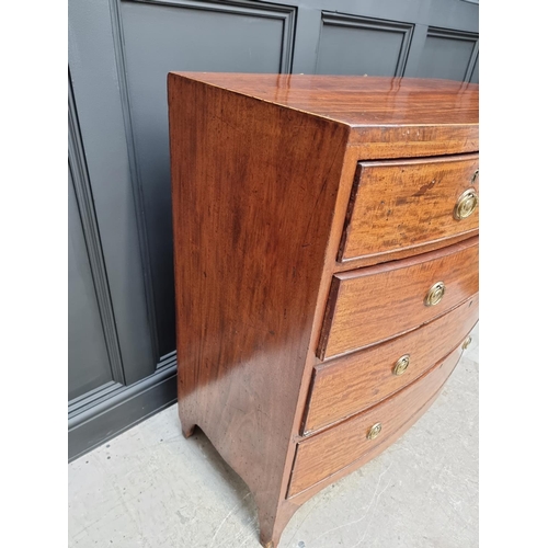 1043 - A George III mahogany and line inlaid bowfront chest of drawers, 105cm wide. 