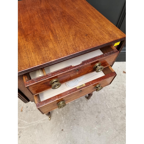 1057 - An early 19th century mahogany Pembroke work table, 47cm wide. 