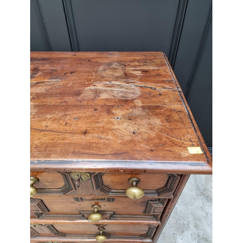 1063 - A rare late 17th century solid walnut geometrically moulded chest of drawers, on bun feet, 98.5cm wi... 