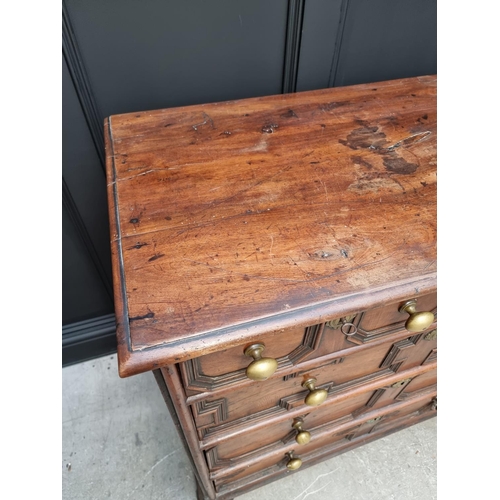 1063 - A rare late 17th century solid walnut geometrically moulded chest of drawers, on bun feet, 98.5cm wi... 