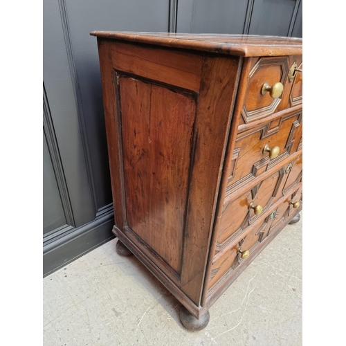 1063 - A rare late 17th century solid walnut geometrically moulded chest of drawers, on bun feet, 98.5cm wi... 