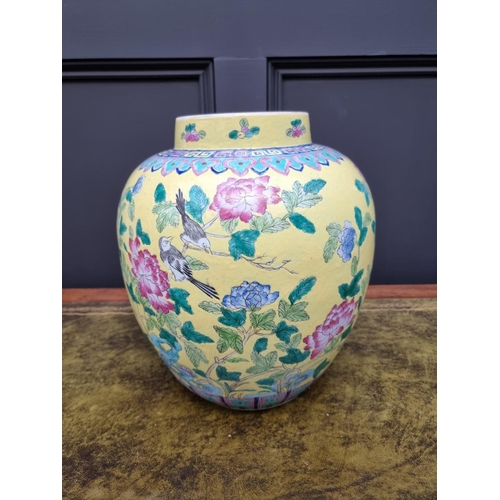 1432 - A large Chinese famille rose yellow ground jar, 33cm high.